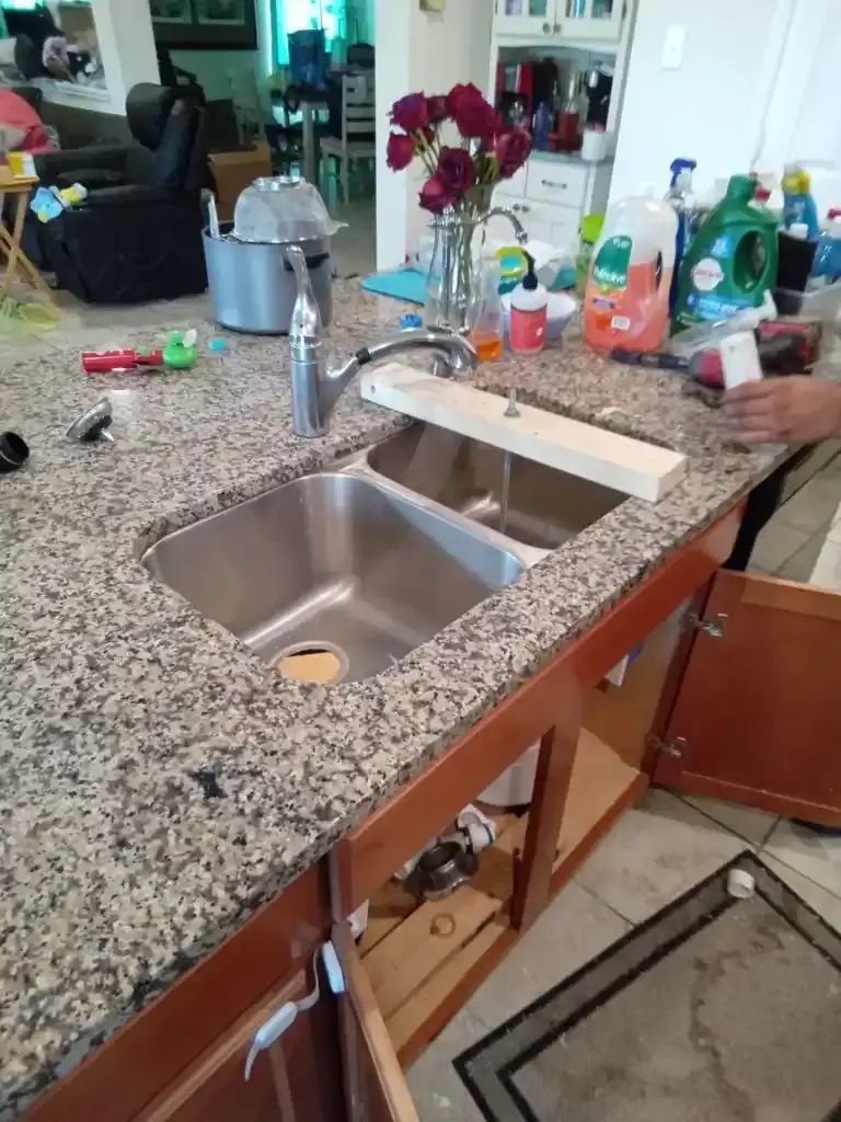 A newly fitted under-mount kitchen sink installed by Texas Quality Plumbing in Houston