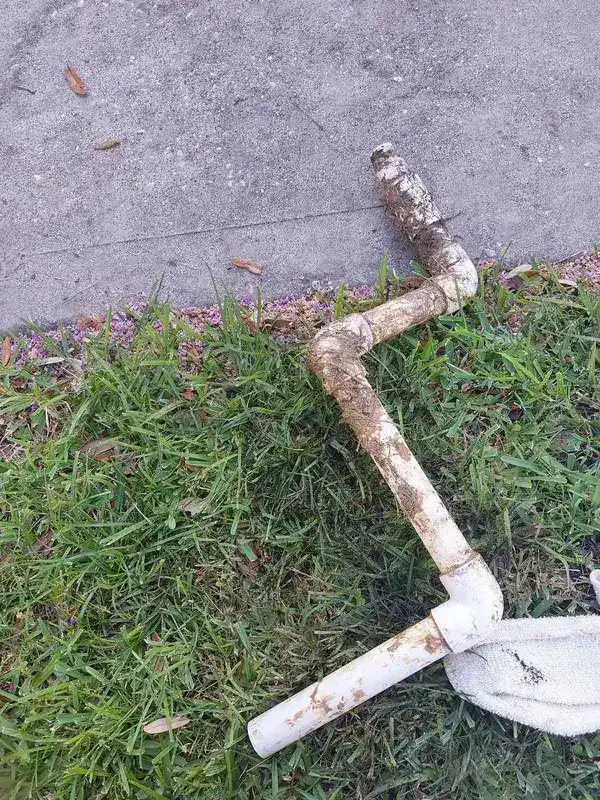 A corroded section of main water line removed from a League City home